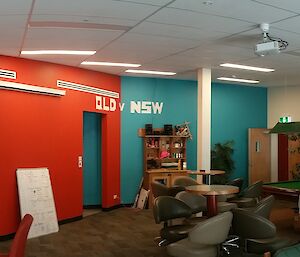 The completed bar with red and blue walls and the new bar area