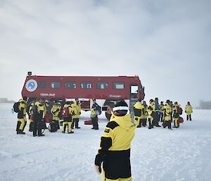 Newly arrived expeditioners at Wilkins Aerodrome ready to get on the Terrabus for the 4 hour ride down to station