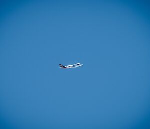 The Qantas plane in the sky above Casey