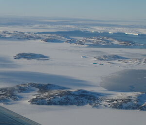 The Browning Peninsula with the Vanderford Glacier in the distance from up in the Basler JKB