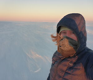 expeditioner on ice plain