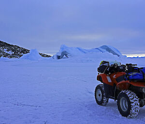 Quad travel over sea ice and jade berg