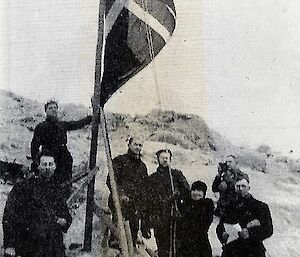 Caroline Mikkelsen raises the Norwegian flag