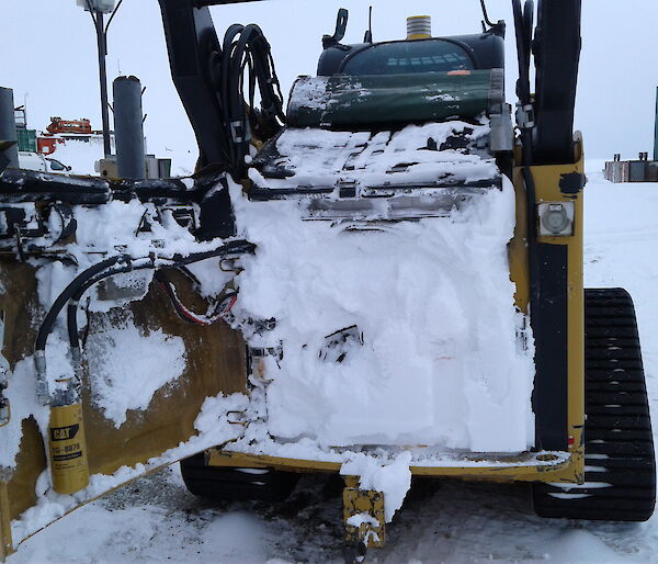 Blizzed Skid Steer Cat 297C in Antarctica