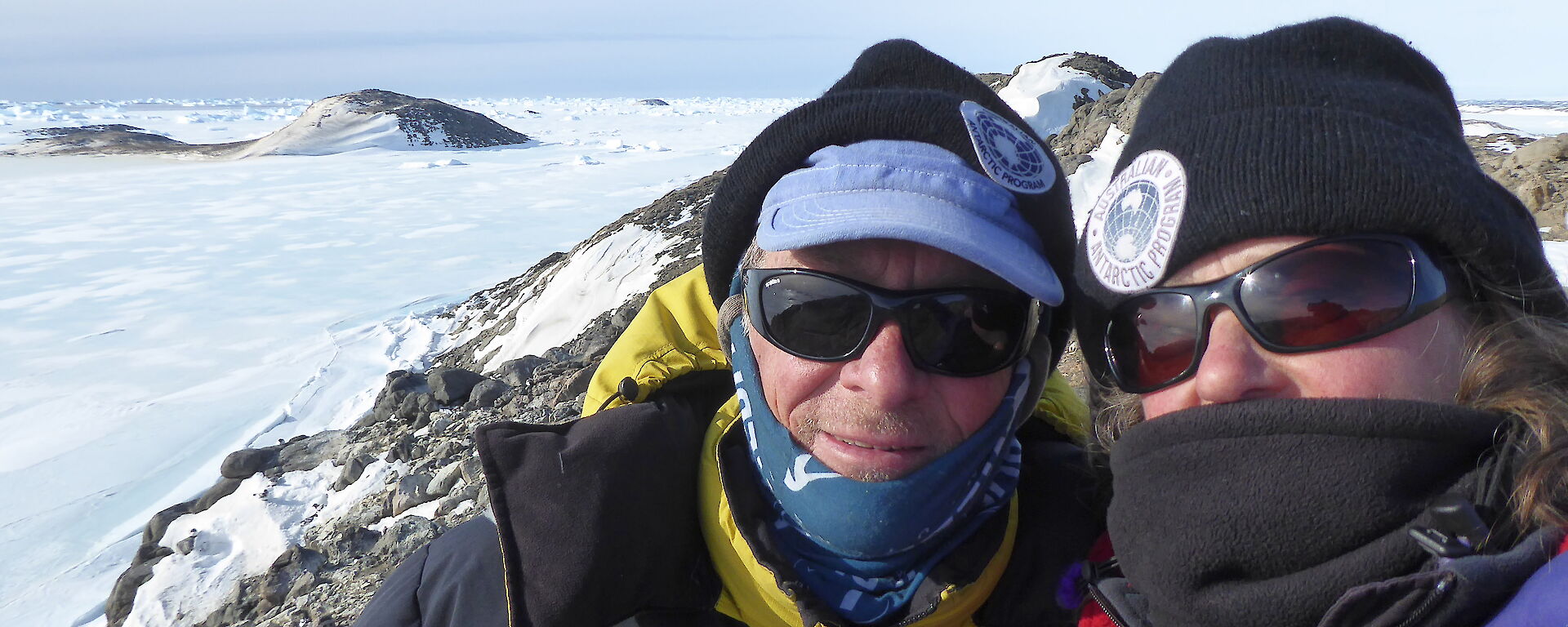 Scientists Colin and Louise stand atop their rocky island office
