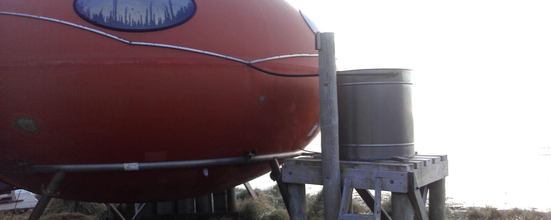 Brothers Point hut on Macquarie Island showing the collecting tube going into the water tank