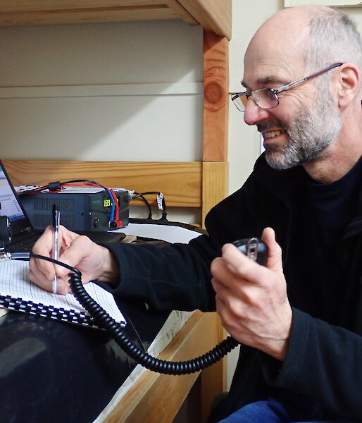 Norbert — call sign VK0AI — in the Ham Shack on the top of Hut Hill making contact with ham operators around the world.