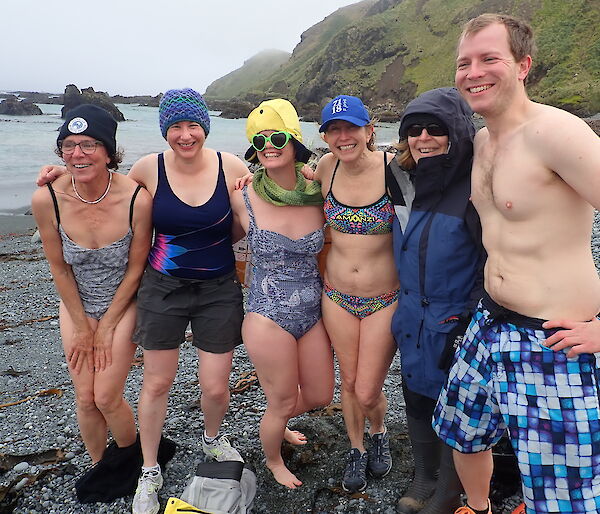 A group of swimmers preparing for the Australia Day swim — plus the observer, there to check for any hazards