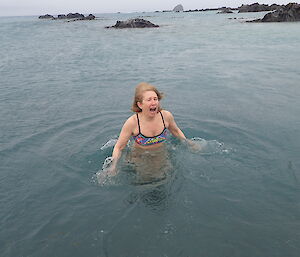 Annette feeling the cold as she goes for a dip on the west coast at Macca on Australia Day