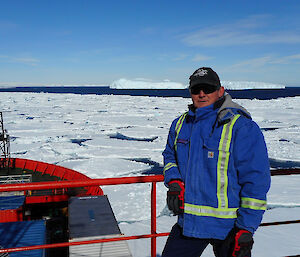 Expeditioner on ship in pack ice