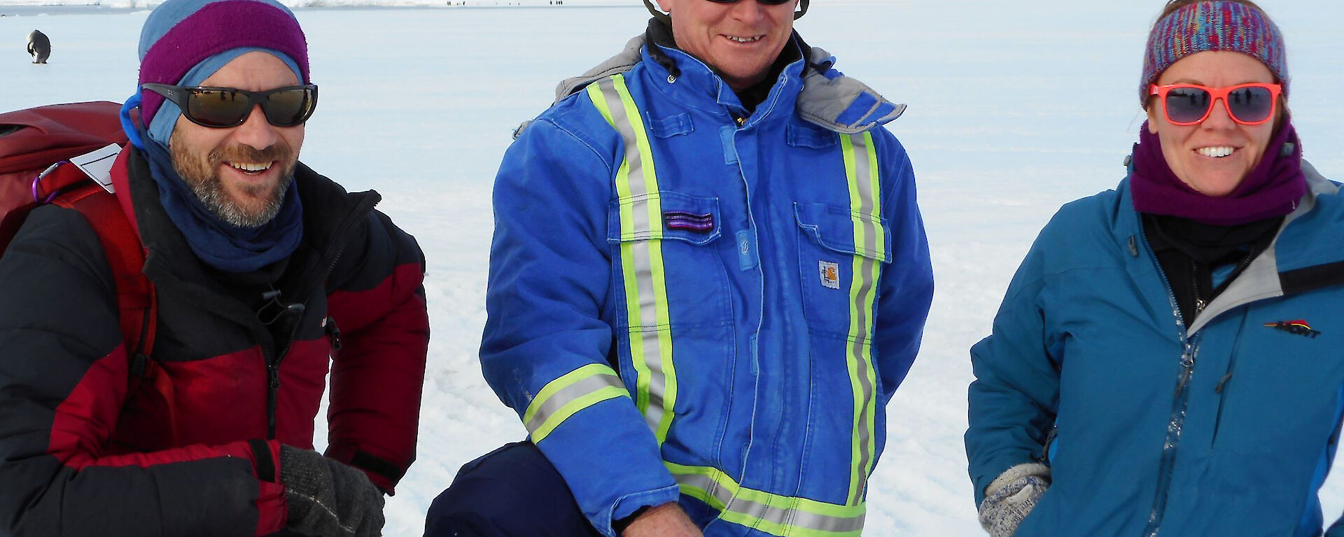 Three wildlife rangers on fast ice at Dumont Durville