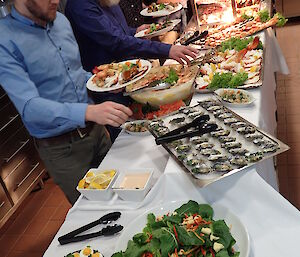 A line of people getting food