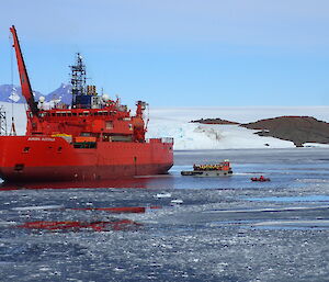 Incoming Mawson expeditioners transferring to shore via barge in Kista Strait
