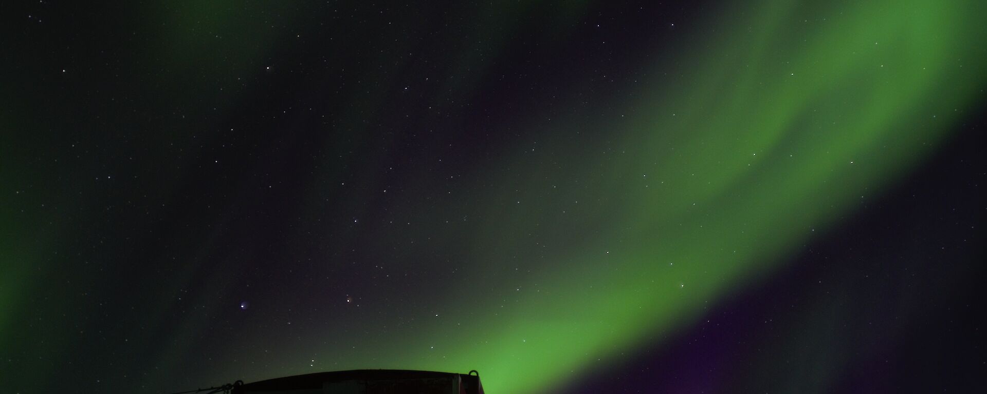 Aurora over Henderson Hut — Mawson Station.