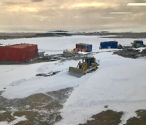 Clearing an access road after a snow blizzard — Mawson Station.