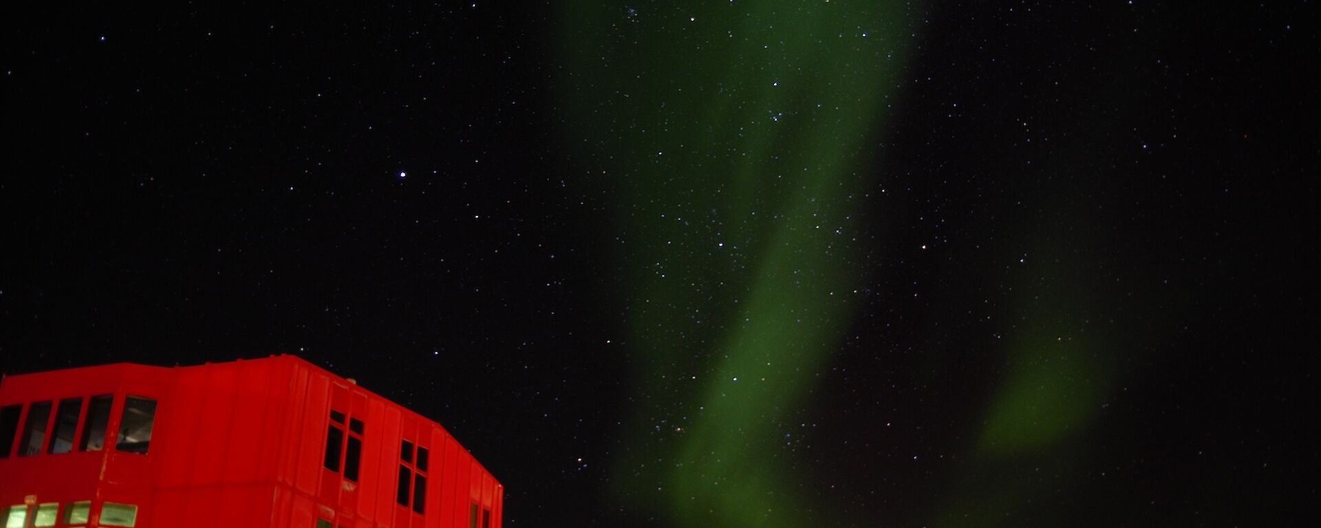 Another spectacular Mawson aurora over the iconic Red Shed.