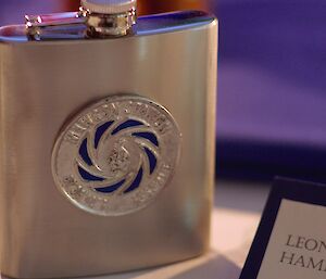 Mawson Midwinter gift — hip flask emblazoned with 72nd ANARE logo — created by Chris ‘Scottish’ George.