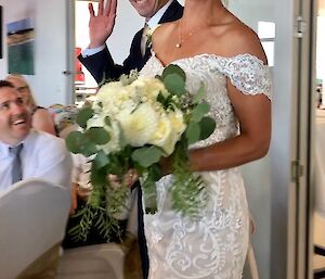 Mawson Plumber Tom Carew with his wife Kylie on their wedding day.