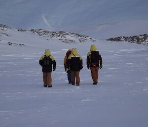 Four Mawson expeditioners enroute to Taylor Rookery to conduct the annual Emperor penguin photographic census — June 2019.