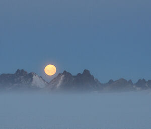 Moon over Mawson mountains — by Carpenter Scottish.