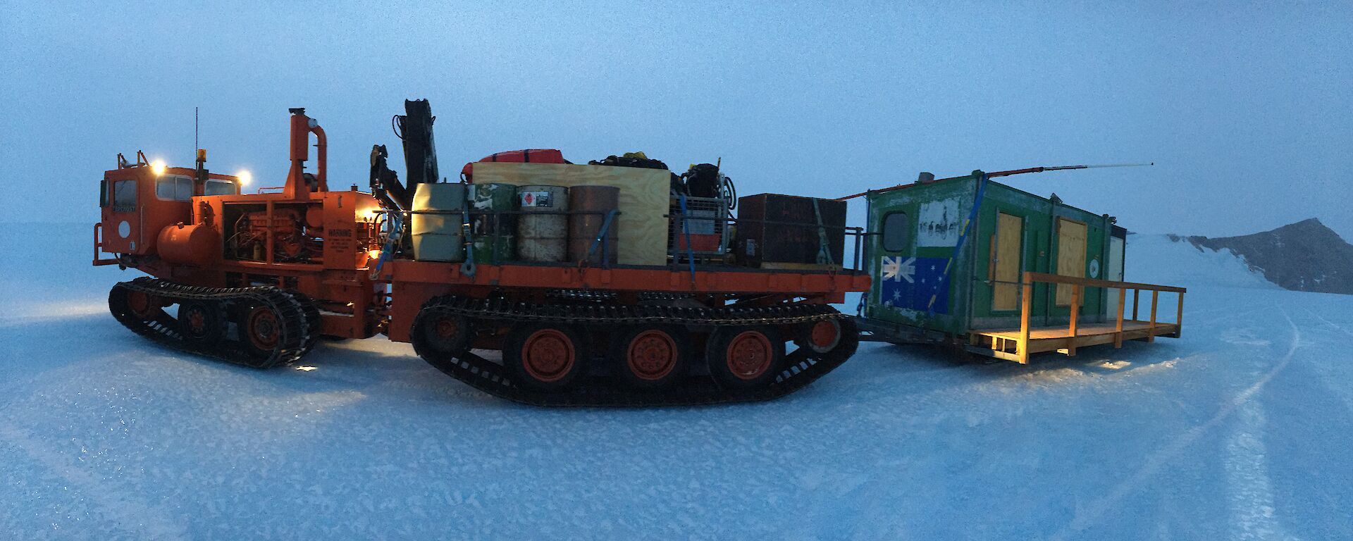 Rumdoodle Hut being returned to station through the Framnes Mountains on a K1 Foremost Pioneer.