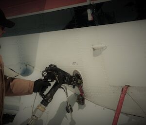 Man refuelling the de Havilland DHC 6