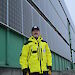 Australian Antarctic Division Director Kim Ellis beside a solar panel installation at Casey research station.