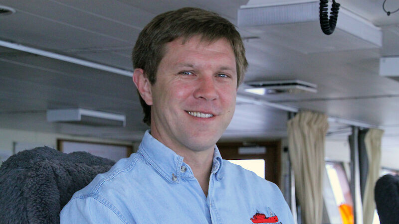 Captain Scott Laughlin at the helm of the Aurora Australis in 2013.