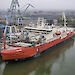 The Nuyina under construction in the river beside the Damen shipyards.