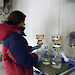 Dr Petrou filtering phytoplankton samples in a 0°C containerised laboratory at Davis research station.