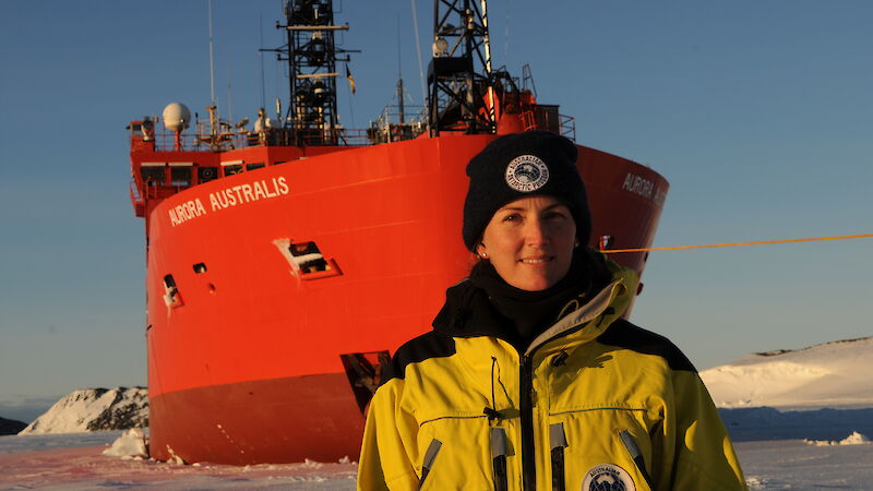 Sarah standing at the bow of the Aurora Australis in Antarctica.