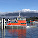 The two Antarctic landing barges undergoing open water trials in the River Derwent.