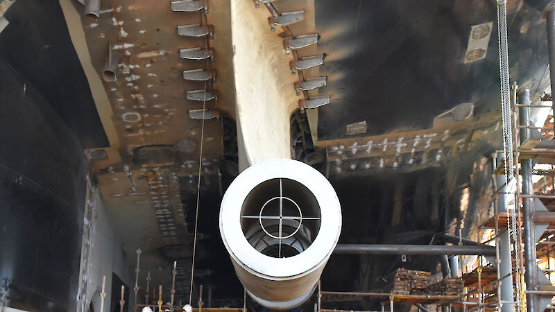 A tube of steel at the stern of the ship that will hold one of the ship’s propeller shafts.