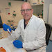 Scientist with a test tube in his laboratory.