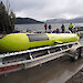 The 7 metre long yellow autonomous underwater vehicle on a trailer backing into Lake St Clair.