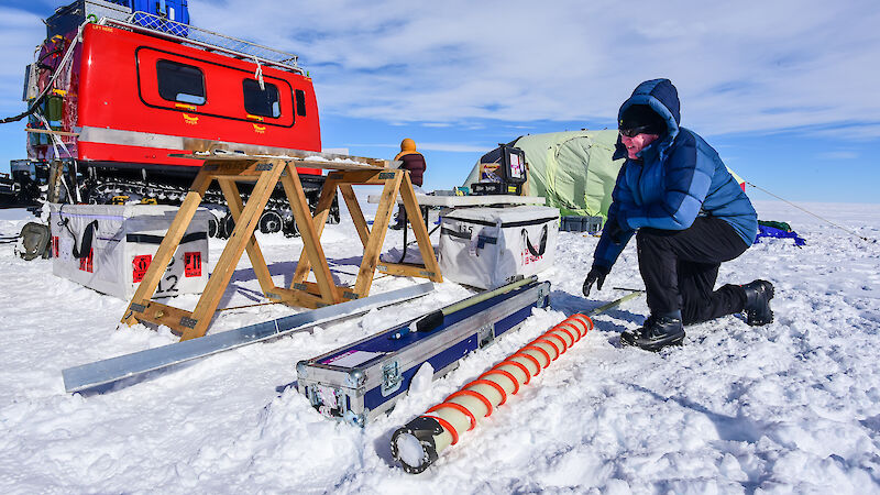 Scientist extracts a core from the ice core drill at Law Dome during a project in 2015.