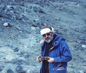 Man standing amongst rocks at Marine Plain in 1988.
