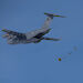 The RAAF C-17A drops spare parts for snow blowers near Casey research station.