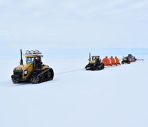 The French traverse from Dumont d’Urville to Concordia used a paired tractor system to pull 8 to 10 sleds.