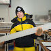 Dr Tessa Vance holding an ice core in her Tasmanian laboratory.