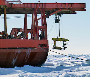 An Autonomous Underwater Vehicle is deployed from the trawl deck of the Aurora Australis