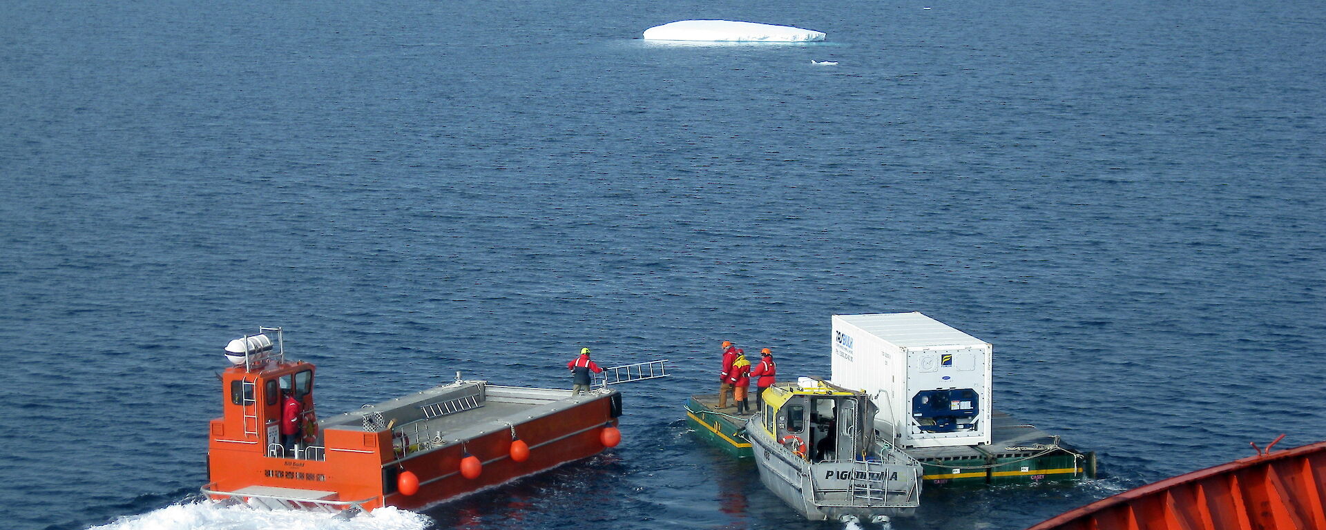 A barge delivering a refrigerated container from the ship to Casey research station.