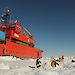 Scientists collect samples on the sea ice beside the ship Aurora Australis.