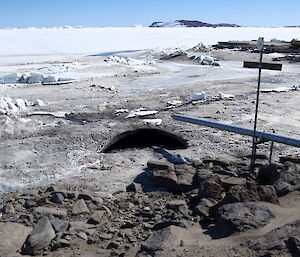 A hole in sea ice near the Davis coastline caused by heated effluent.