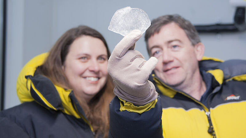 Associate Professor Nerilie Abram and Australian Antarctic Division ice core scientist Dr Mark Curran (who was a co-author on the Nature paper) examine a piece of Antarctic ice core.