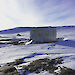 The ‘magnetic absolute hut’ — a small wooden hut sitting in isolation on a plateau at Mawson.