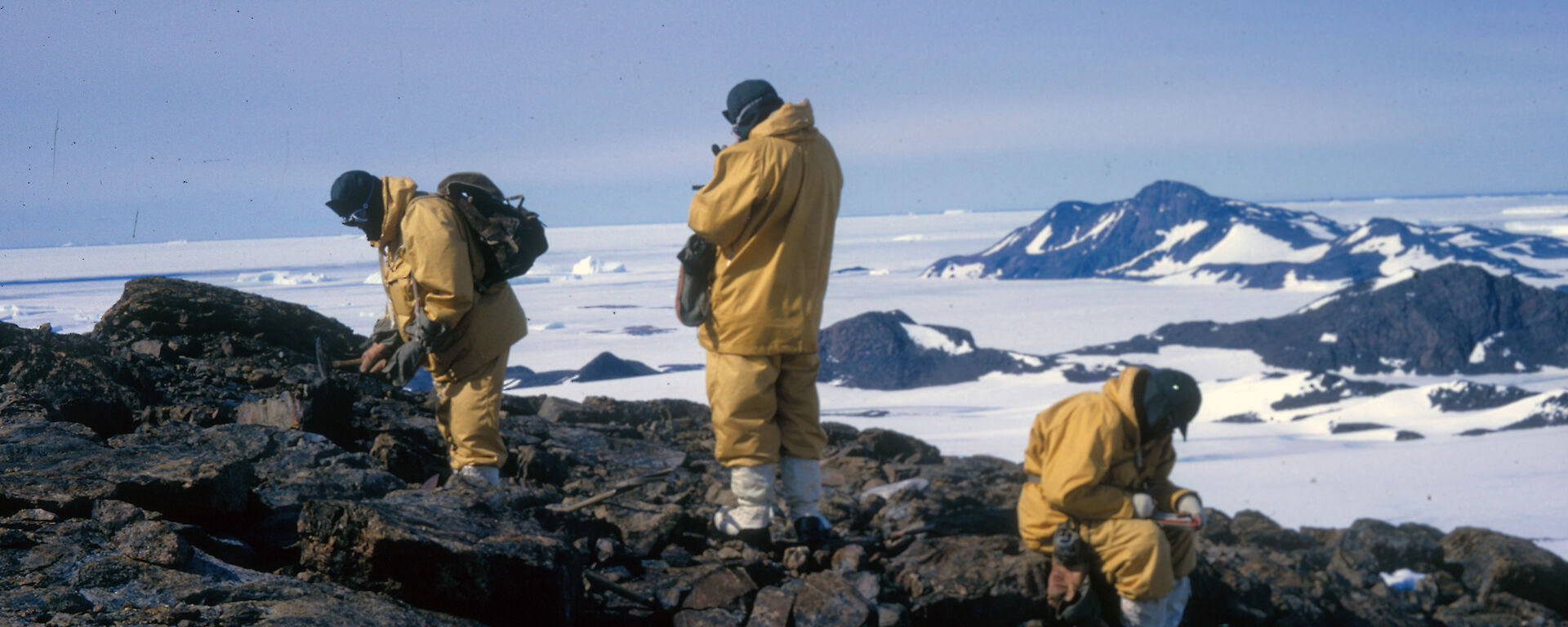 Three geoscientists working on the Taylor Glacier, Antarctica.