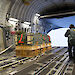 Pallets of cargo being deployed out the back of a C17A aircraft over Antarctica.