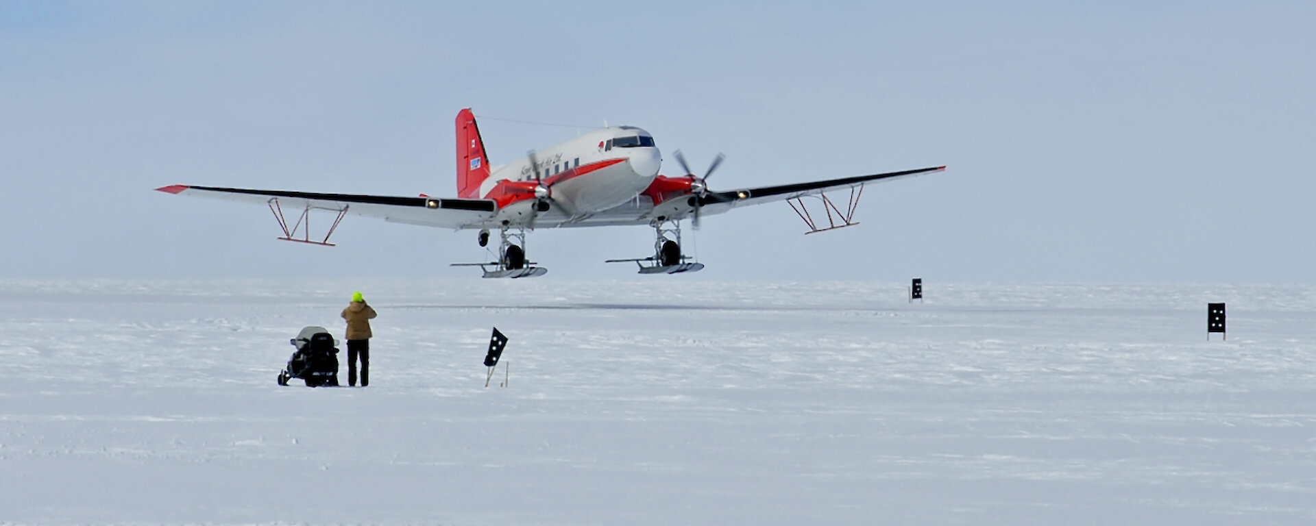 The 72 year old Basler BT-67 aircraft with its wing-mounted, ice penetrating radar antennae