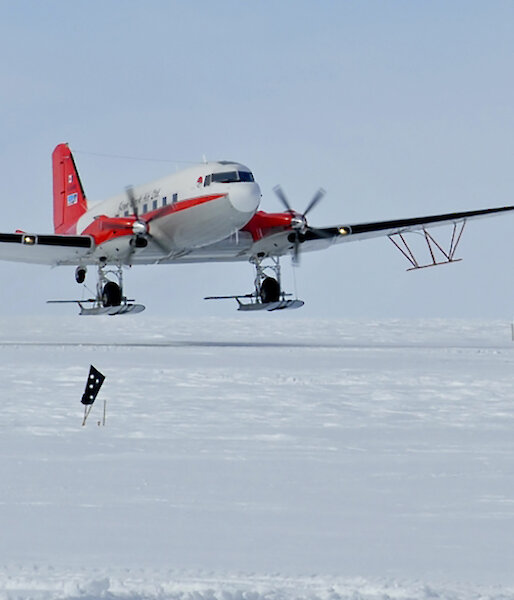 The 72 year old Basler BT-67 aircraft with its wing-mounted, ice penetrating radar antennae